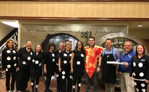 Bank employees dressed as dominos pizza